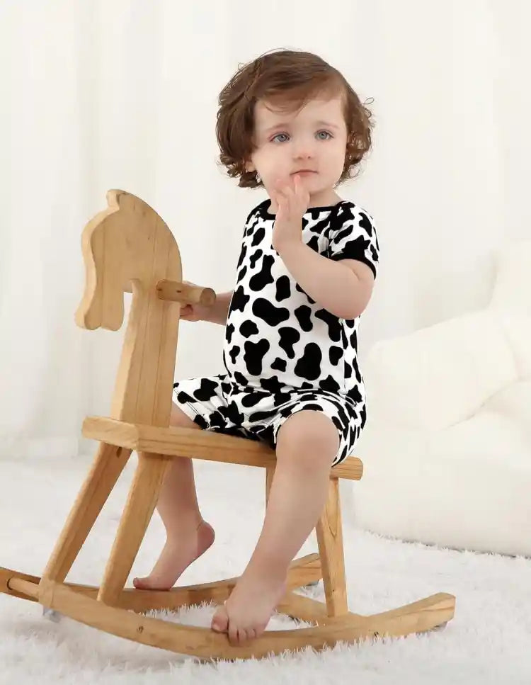 Wholesale newborn rompers and baby onesies in bulk.