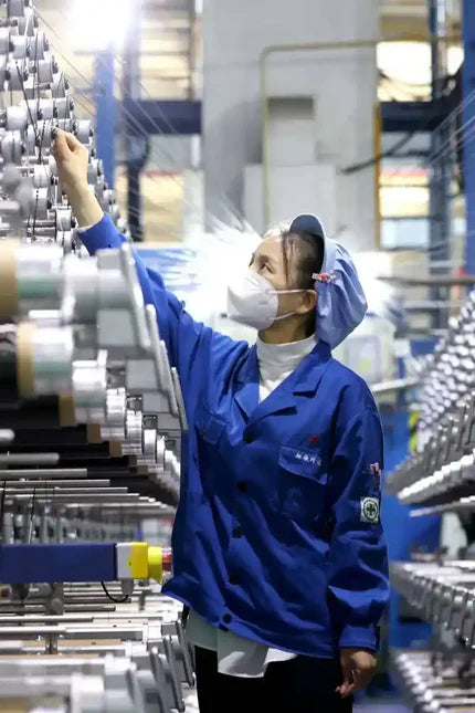 sleepwear production workers manufacturing custom pajamas in factory